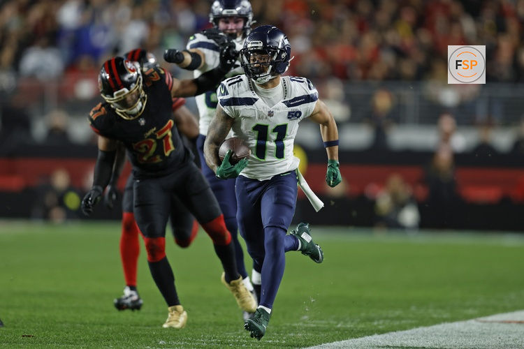 Jan 3, 2026; Santa Clara, California, USA; Seattle Seahawks wide receiver Jaxon Smith-Njigba (11) runs after a catch against the San Francisco 49ers during the first half at Levi's Stadium. Credit: Sergio Estrada-Imagn Images