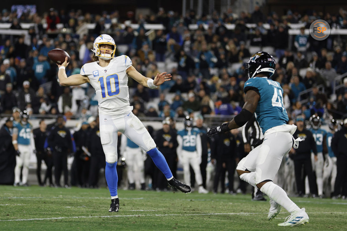 JACKSONVILLE, FL - JANUARY 14: Los Angeles Chargers quarterback Justin Herbert (10) throws a pass during the game between the Los Angeles Chargers and the Jacksonville Jaguars on January 14, 2023 at TIAA Bank Field in Jacksonville, Fl. (Photo by David Rosenblum/Icon Sportswire)