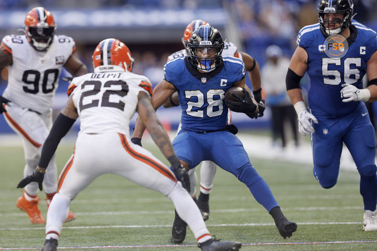 INDIANAPOLIS, IN - OCTOBER 22: Indianapolis Colts running back Jonathan Taylor (28) looks to get around Cleveland Browns safety Grant Delpit (22) during a NFL game between the Cleveland Browns and the Indianapolis Colts on October 22, 2023 at Lucas Oil Stadium in Indianapolis, IN.  (Photo by Jeffrey Brown/Icon Sportswire)