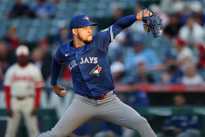 May 7, 2025; Anaheim, California, USA;  Toronto Blue Jays starting pitcher Jose Berrios (17) pitches during the first inning against the Los Angeles Angels at Angel Stadium. Mandatory Credit: Kiyoshi Mio-Imagn Images