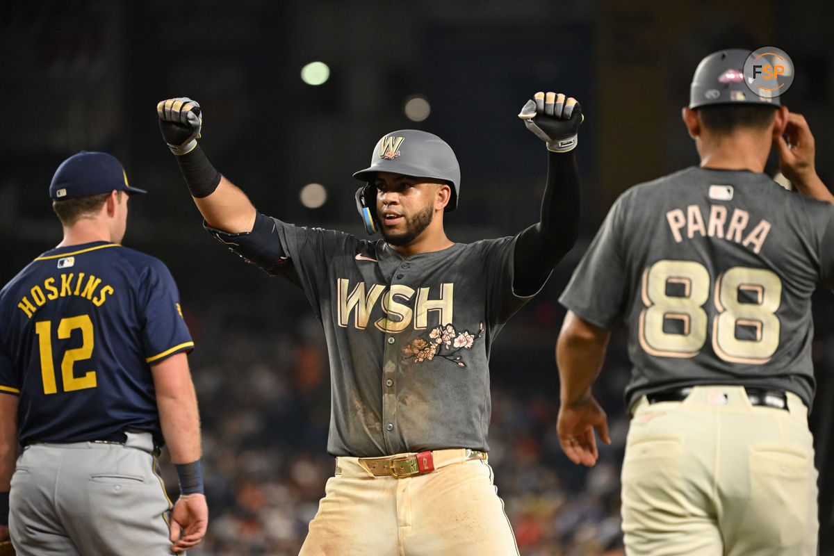 Aug 2, 2024; Washington, District of Columbia, USA; Washington Nationals second baseman Luis Garcia Jr. (2) celebrates after hitting a single against the Milwaukee Brewers during the sixth inning at Nationals Park. Mandatory Credit: Rafael Suanes-USA TODAY Sports