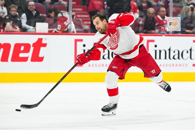 Oct 10, 2026; Montreal, Quebec, CAN;  Detroit Red Wings left wing Viktor Arvidsson (33) shoots the puck during warm-up before the game against the Montreal Canadiens at Bell Centre.  Credit: David Kirouac-Imagn Images
