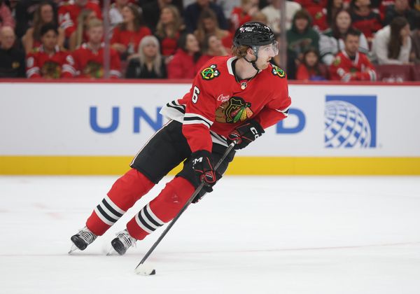 Oct 3, 2025; Chicago, Illinois, USA; Chicago Blackhawks defenseman Sam Rinzel (6) clears the puck during the second period against the Minnesota Wild at United Center. Mandatory Credit: Talia Sprague-Imagn Images