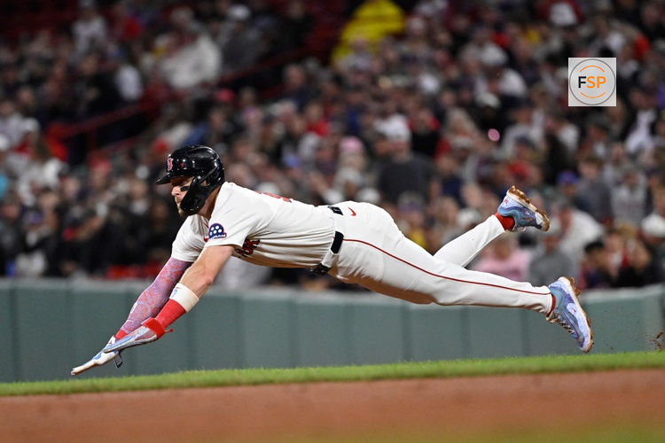 Jul 10, 2025; Boston, Massachusetts, USA; Boston Red Sox shortstop Trevor Story (10) steals second base during the seventh inning against the Tampa Bay Rays at Fenway Park. Credit: Eric Canha-Imagn Images