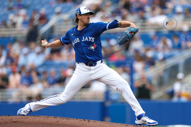 Mar 10, 2025; Dunedin, Florida, USA; Toronto Blue Jays pitcher Kevin Gausman (34) throws a pitch against the Houston Astros in the second inning during spring training at TD Ballpark. Credit: Nathan Ray Seebeck-Imagn Images