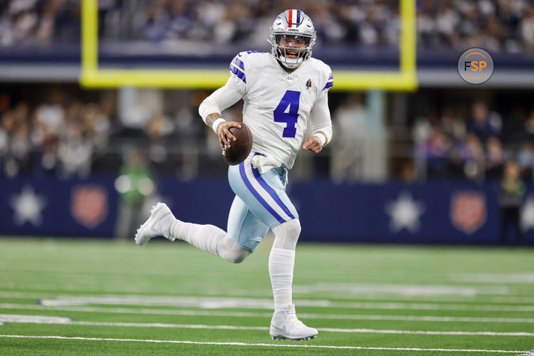 ARLINGTON, TX - NOVEMBER 12: Dallas Cowboys quarterback Dak Prescott (4) runs for a first down during the game between the Dallas Cowboys and the New York Giants on November 12, 2023 at AT&T Stadium in Arlington, Texas. (Photo by Matthew Pearce/Icon Sportswire)