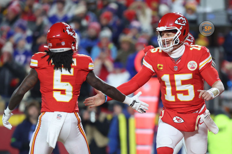 Jan 26, 2025; Kansas City, MO, USA; Kansas City Chiefs quarterback Patrick Mahomes (15) reacts after a touchdown against the Buffalo Bills during the first quarter in the AFC Championship game at GEHA Field at Arrowhead Stadium. Credit: Mark J. Rebilas-Imagn Images