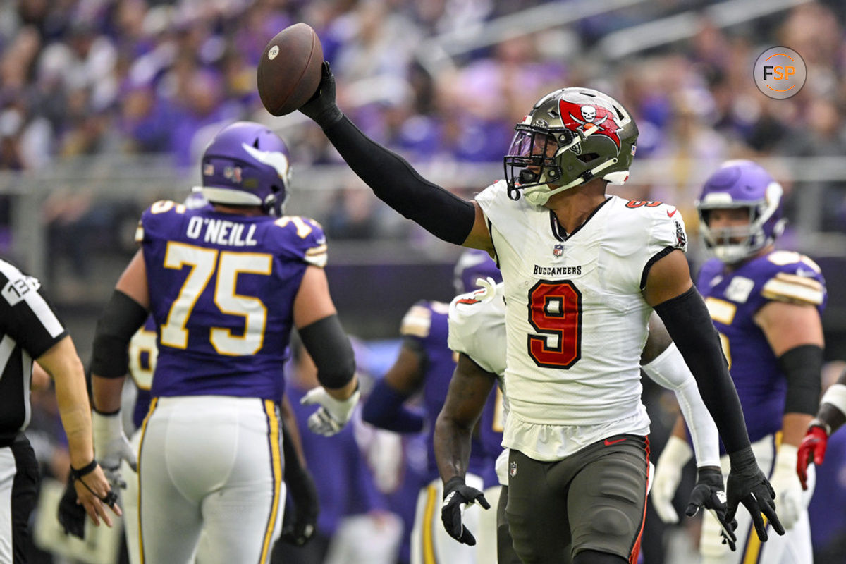 MINNEAPOLIS, MN - SEPTEMBER 10: Tampa Bay Buccaneers linebacker Joe Tryon-Shoyinka (9) celebrates his interception during the first quarter of an NFL game between the Minnesota Vikings and Tampa Bay Buccaneers  on September 10, 2023, at U.S. Bank Stadium in Minneapolis, MN. (Photo by Nick Wosika/Icon Sportswire)