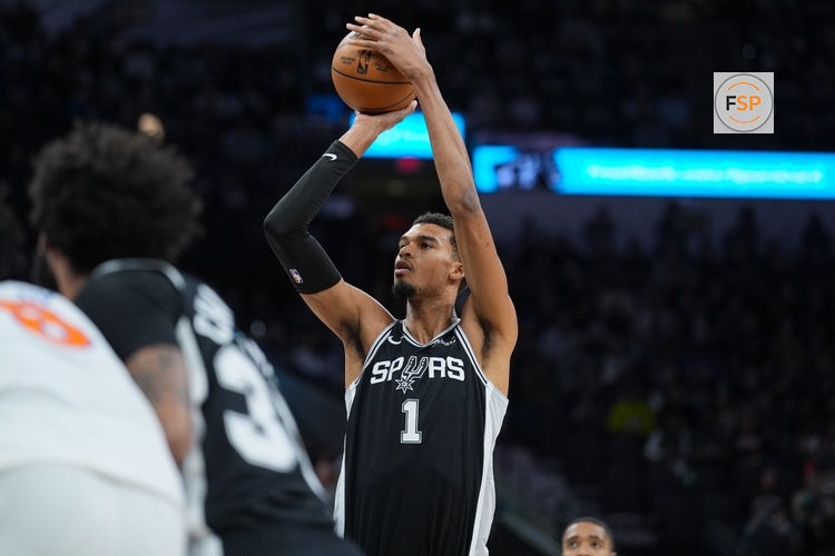 Dec 31, 2025; San Antonio, Texas, USA;  San Antonio Spurs forward Victor Wembanyama (1) shoots a free throw in the first half against the New York Knicks at Frost Bank Center. Credit: Daniel Dunn-Imagn Images