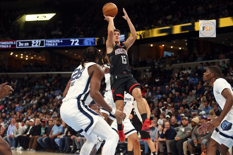 Nov 5, 2025; Memphis, Tennessee, USA; Houston Rockets guard Reed Sheppard (15) shoots during the third quarter against the Memphis Grizzlies at FedExForum. Credit: Petre Thomas-Imagn Images