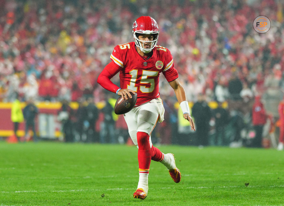 Nov 4, 2024; Kansas City, Missouri, USA; Kansas City Chiefs quarterback Patrick Mahomes (15) rolls out to pass during the second half against the Tampa Bay Buccaneers at GEHA Field at Arrowhead Stadium. Credit: Jay Biggerstaff-Imagn Images