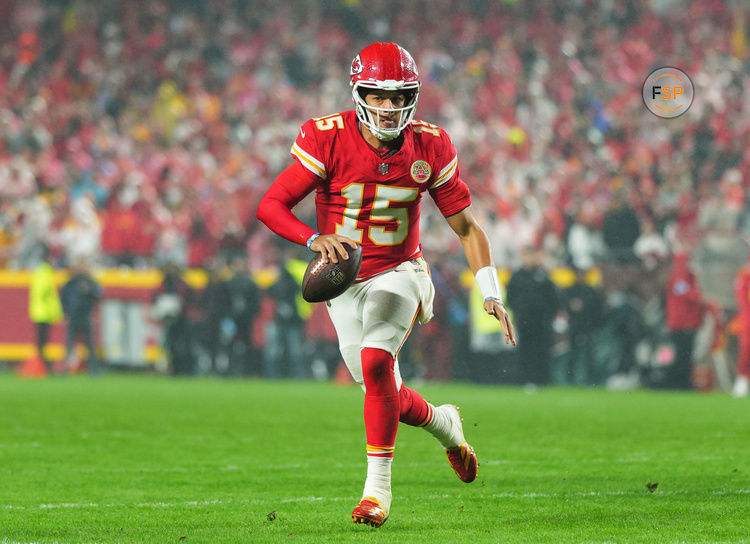 Nov 4, 2024; Kansas City, Missouri, USA; Kansas City Chiefs quarterback Patrick Mahomes (15) rolls out to pass during the second half against the Tampa Bay Buccaneers at GEHA Field at Arrowhead Stadium. Credit: Jay Biggerstaff-Imagn Images