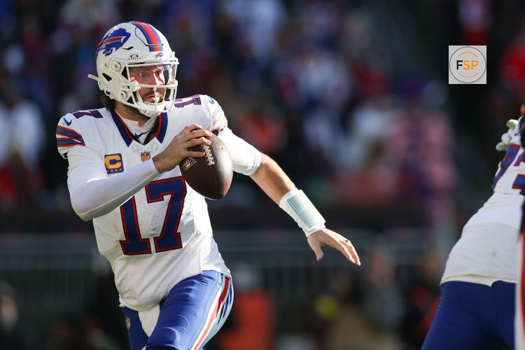 Dec 21, 2025; Cleveland, Ohio, USA;  Buffalo Bills quarterback Josh Allen (17) looks downfield against the Cleveland Browns during the first half at Huntington Bank Field. Credit: Scott Galvin-Imagn Images
