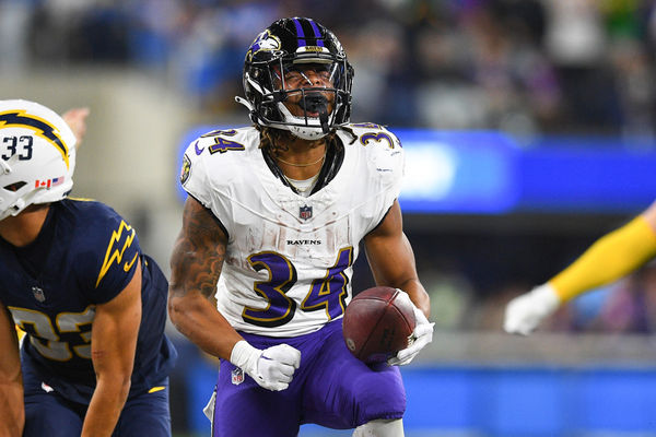 INGLEWOOD, CA - NOVEMBER 26: Baltimore Ravens running back Keaton Mitchell (34) celebrates after a run during the NFL regular season game between the Baltimore Ravens and the Los Angeles Chargers on November 26, 2023, at SoFi Stadium in Inglewood, CA. (Photo by Brian Rothmuller/Icon Sportswire)