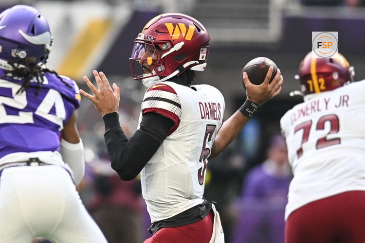 Dec 7, 2025; Minneapolis, Minnesota, USA; Washington Commanders quarterback Jayden Daniels (5) drops back to pass against the Minnesota Vikings during the first half at U.S. Bank Stadium. Credit: Jeffrey Becker-Imagn Images