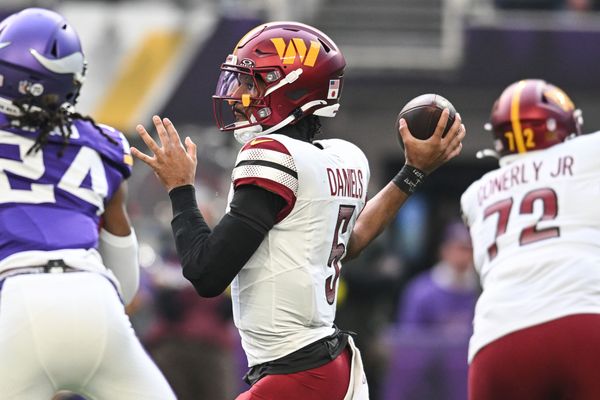 Dec 7, 2025; Minneapolis, Minnesota, USA; Washington Commanders quarterback Jayden Daniels (5) drops back to pass against the Minnesota Vikings during the first half at U.S. Bank Stadium. Mandatory Credit: Jeffrey Becker-Imagn Images