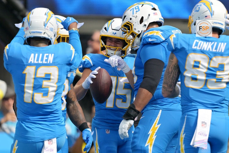Oct 5, 2025; Inglewood, California, USA; Los Angeles Chargers wide receiver Ladd McConkey (15) celebrates with teammates after scoring a touchdown against the Washington Commanders in the first quarter at SoFi Stadium. Credit: Jayne Kamin-Oncea-Imagn Images