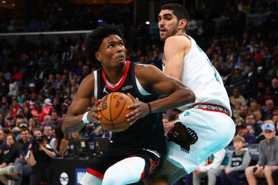 Jan 30, 2025; Memphis, Tennessee, USA; Houston Rockets forward Amen Thompson (1) drives to the basket around Memphis Grizzlies forward Santi Aldama (7) during the fourth quarter at FedExForum. Mandatory Credit: Petre Thomas-Imagn Images