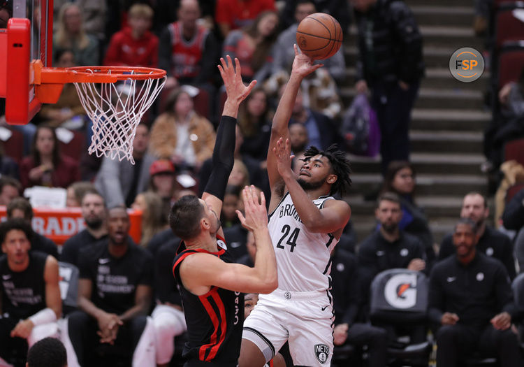 CHICAGO, IL - NOVEMBER 03: Brooklyn Nets guard Cam Thomas (24) shoots the ball over Chicago Bulls center Nikola Vucevic (9) during the second half of a NBA In-Season Tournament between the Brooklyn Nets and the Chicago Bulls on November 3, 2023 at the United Center in Chicago, IL. (Photo by Melissa Tamez/Icon Sportswire)