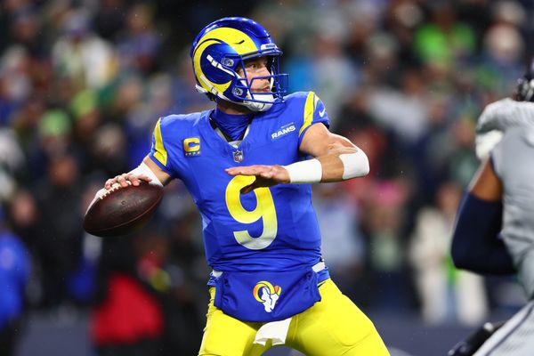 Dec 18, 2025; Seattle, Washington, USA; Los Angeles Rams quarterback Matthew Stafford (9) passes against the Seattle Seahawks in the first half at Lumen Field. Mandatory Credit: Kevin Ng-Imagn Images