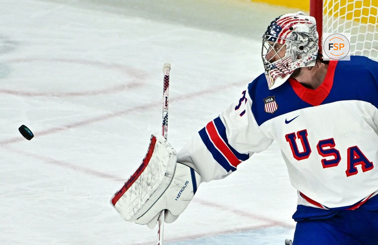 [US, Mexico & Canada customers only] Feb 15, 2026; Milan, Italy; Connor Hellebuyck of United States in action against Germany in men's ice hockey group A play during the Milano Cortina 2026 Olympic Winter Games at Milano Santagiulia Ice Hockey Arena. Credit: Marton Monus/Reuters via Imagn Images