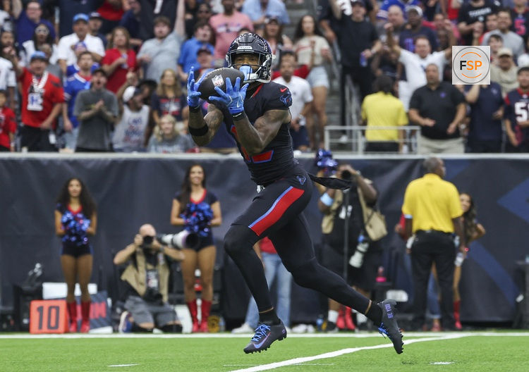 Oct 6, 2024; Houston, Texas, USA; Houston Texans wide receiver Nico Collins (12) makes a reception for a touchdown during the first quarter against the Buffalo Bills at NRG Stadium. Credit: Troy Taormina-Imagn Images