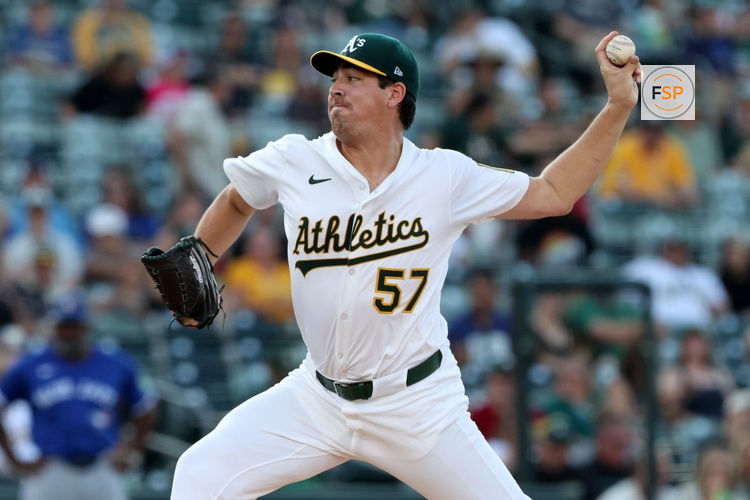 Jul 12, 2025; West Sacramento, California, USA; Athletics starting pitcher Jacob Lopez (57) throws a pitch against the Toronto Blue Jays during the first inning at Sutter Health Park. Credit: Dennis Lee-Imagn Images