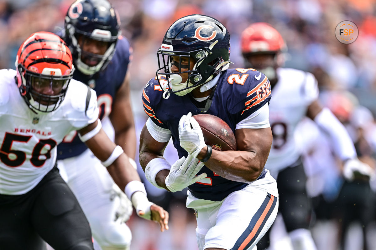 Aug 17, 2024; Chicago, Illinois, USA; Chicago Bears running back Khalil Herbert (24) runs the ball against the Cincinnati Bengals during the first quarter at Soldier Field. Credit: Daniel Bartel-USA TODAY Sports