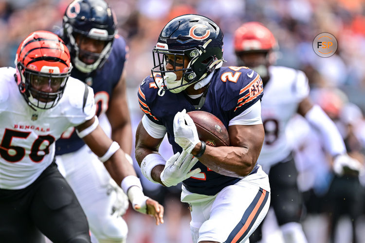 Aug 17, 2024; Chicago, Illinois, USA; Chicago Bears running back Khalil Herbert (24) runs the ball against the Cincinnati Bengals during the first quarter at Soldier Field. Credit: Daniel Bartel-USA TODAY Sports