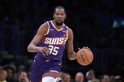 Mar 16, 2025; Los Angeles, California, USA; Phoenix Suns forward Kevin Durant (35) dribbles the ball against the Los Angeles Lakers in the second half at Crypto.com Arena. Mandatory Credit: Kirby Lee-Imagn Images
