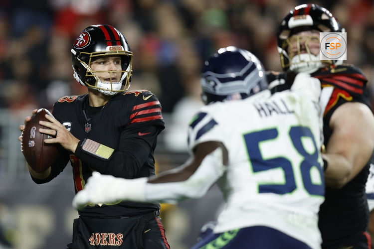 Jan 3, 2026; Santa Clara, California, USA; San Francisco 49ers quarterback Brock Purdy (13) drops back to pass against the Seattle Seahawks during the second half at Levi's Stadium. Credit: Sergio Estrada-Imagn Images