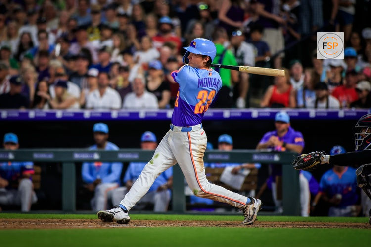 Jul 4, 2025; Denver, Colorado, USA; Colorado Rockies outfielder Mickey Moniak (22) bats against the Chicago White Sox at Coors Field. Credit: Chet Strange-Imagn Images