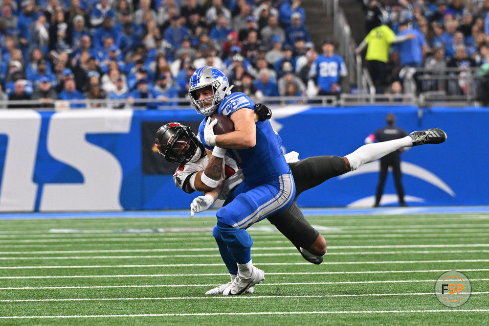 DETROIT, MI - JANUARY 21: Detroit Lions tight end Sam LaPorta (87) is brought down after a catch during the NFC Divisional playoff game between the Detroit Lions and the Tampa Bay Buccaneers on Sunday January 21, 2024 at Ford Field in Detroit, MI. (Photo by Steven King/Icon Sportswire)