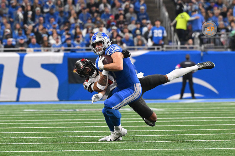 DETROIT, MI - JANUARY 21: Detroit Lions tight end Sam LaPorta (87) is brought down after a catch during the NFC Divisional playoff game between the Detroit Lions and the Tampa Bay Buccaneers on Sunday January 21, 2024 at Ford Field in Detroit, MI. (Photo by Steven King/Icon Sportswire)