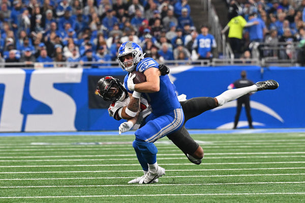 DETROIT, MI - JANUARY 21: Detroit Lions tight end Sam LaPorta (87) is brought down after a catch during the NFC Divisional playoff game between the Detroit Lions and the Tampa Bay Buccaneers on Sunday January 21, 2024 at Ford Field in Detroit, MI. (Photo by Steven King/Icon Sportswire)