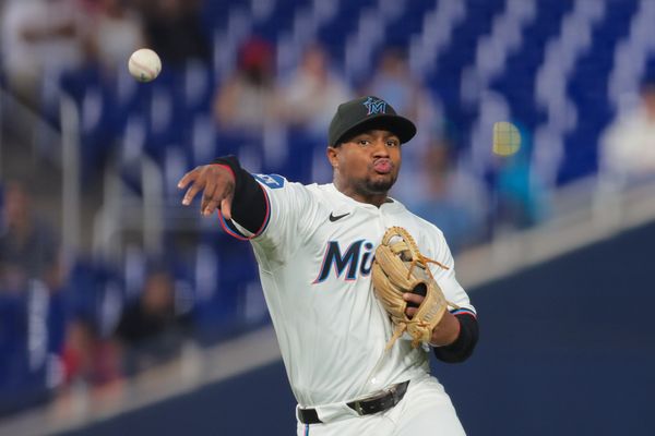 Apr 21, 2025; Miami, Florida, USA; Miami Marlins shortstop Xavier Edwards (9) throws to first base to retire Cincinnati Reds left fielder Spencer Steer (not pictured) during the seventh inning at loanDepot Park. Mandatory Credit: Sam Navarro-Imagn Images