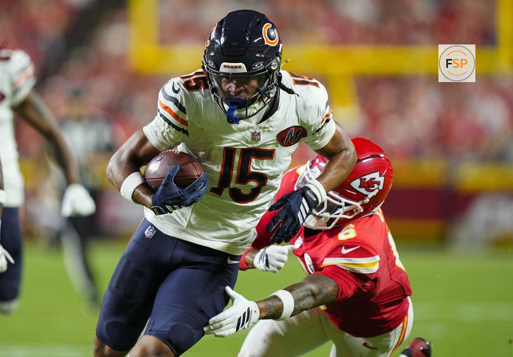 Aug 22, 2025; Kansas City, Missouri, USA; Chicago Bears wide receiver Rome Odunze (15) runs with the ball against Kansas City Chiefs safety Bryan Cook (6) during the first half at GEHA Field at Arrowhead Stadium. Credit: Jay Biggerstaff-Imagn Images