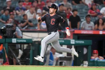 Aug 25, 2026; Anaheim, California, USA; Cleveland Guardians designated hitter Steven Kwan (38) scores in the eighth inning against the Los Angeles Angels at Angel Stadium. Mandatory Credit: Kirby Lee-Imagn Images