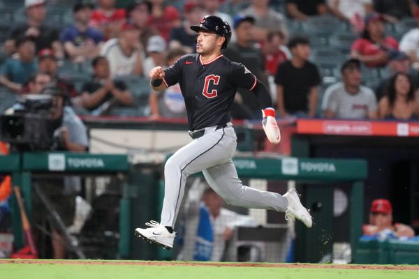 Aug 25, 2026; Anaheim, California, USA; Cleveland Guardians designated hitter Steven Kwan (38) scores in the eighth inning against the Los Angeles Angels at Angel Stadium. Mandatory Credit: Kirby Lee-Imagn Images
