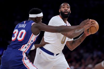 Oct 20, 2026; New York, New York, USA; New York Knicks center Andre Drummond (0) looks to pass the ball against Philadelphia 76ers center Adem Bona (30) during the first quarter at Madison Square Garden. Mandatory Credit: Brad Penner-Imagn Images