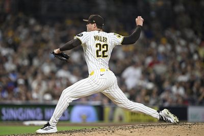 Jun 23, 2026; San Diego, California, USA; San Diego Padres pitcher Mason Miller (22) delivers during the ninth inning against the Atlanta Braves at Petco Park. Mandatory Credit: Denis Poroy-Imagn Images