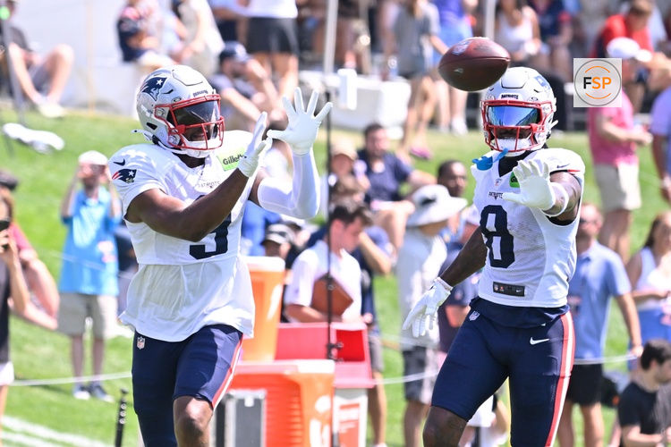 Jul 28, 2025; Foxborough, MA, USA; New England Patriots wide receiver Kayshon Boutte (9) does a drill with wide receiver Stefon Diggs (8) during training camp at Gillette Stadium. Credit: Eric Canha-Imagn Images