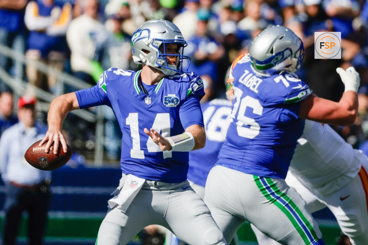 Oct 5, 2025; Seattle, Washington, USA; Seattle Seahawks quarterback Sam Darnold (14) stands in the pocket against the Tampa Bay Buccaneers during the first half at Lumen Field. Credit: Joe Nicholson-Imagn Images