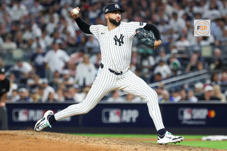 Oct 7, 2025; Bronx, New York, USA; New York Yankees relief pitcher Devin Williams (38) delivers a pitch in the seventh inning against the Toronto Blue Jays during game three of the ALDS round for the 2025 MLB playoffs at Yankee Stadium. Credit: Vincent Carchietta-Imagn Images