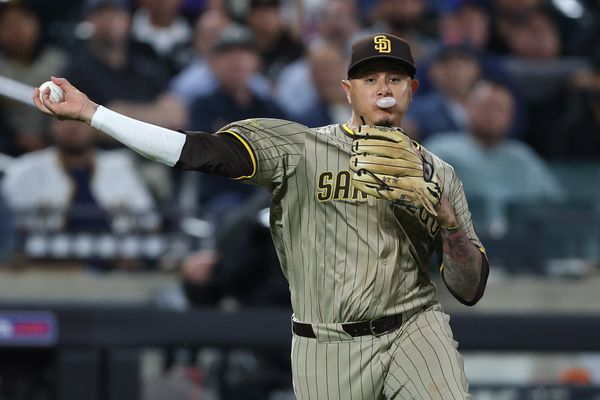 Sep 17, 2025; New York City, New York, USA; San Diego Padres third baseman Manny Machado (13) throws the ball to first base for an out during the ninth inning against the New York Mets at Citi Field. Mandatory Credit: Vincent Carchietta-Imagn Images