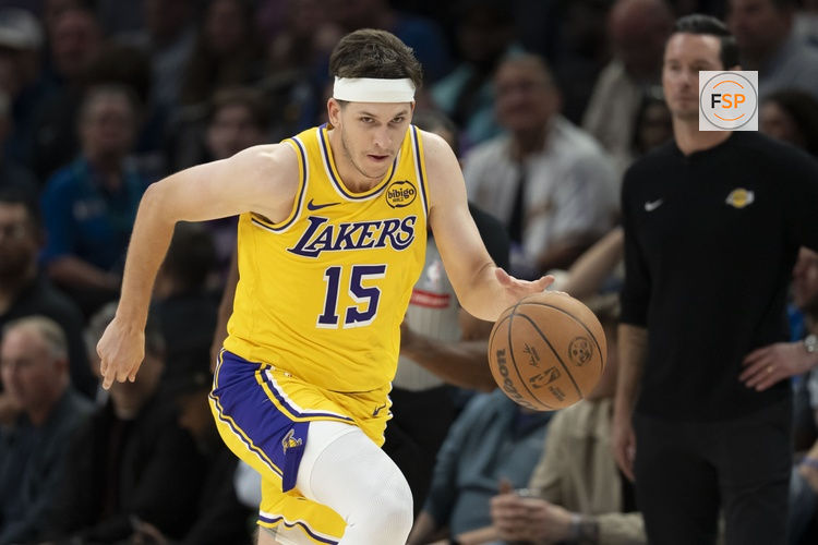 Oct 29, 2025; Minneapolis, Minnesota, USA; Los Angeles Lakers guard Austin Reaves (15) dribbles the ball against the Minnesota Timberwolves in the second half at Target Center. Credit: Jesse Johnson-Imagn Images