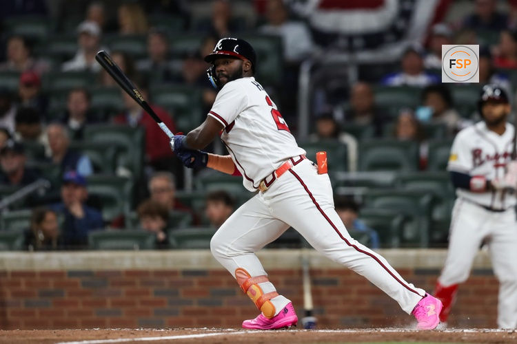 Mar 28, 2026; Cumberland, Georgia, USA; Atlanta Braves center fielder Michael Harris II (23) hits a double against the Kansas City Royals in the fifth inning at Truist Park. Credit: Mady Mertens-Imagn Images