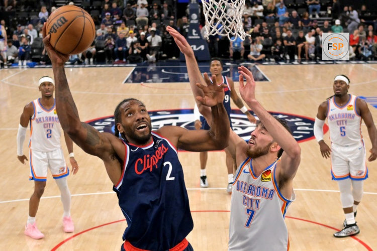 Apr 8, 2026; Inglewood, California, USA;  Oklahoma City Thunder center Chet Holmgren (7) defends a shot by Los Angeles Clippers forward Kawhi Leonard (2) in the first half at Intuit Dome. Credit: Jayne Kamin-Oncea-Imagn Images