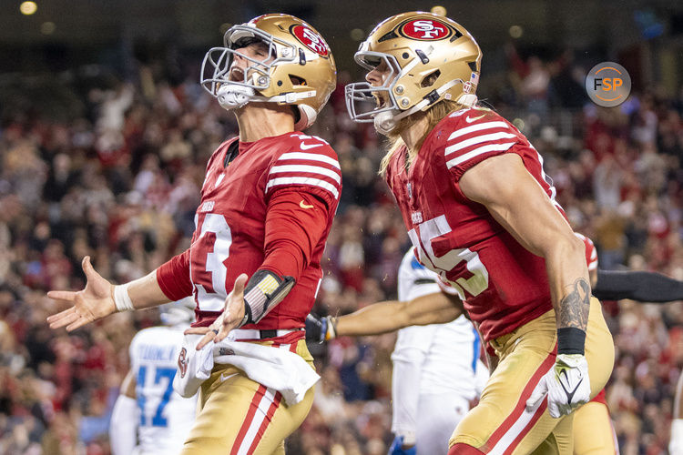 December 30, 2024; Santa Clara, California, USA; San Francisco 49ers quarterback Brock Purdy (13) celebrates with tight end George Kittle (85) after scoring a touchdown against the Detroit Lions during the second quarter at Levi's Stadium. Credit: Kyle Terada-Imagn Images
