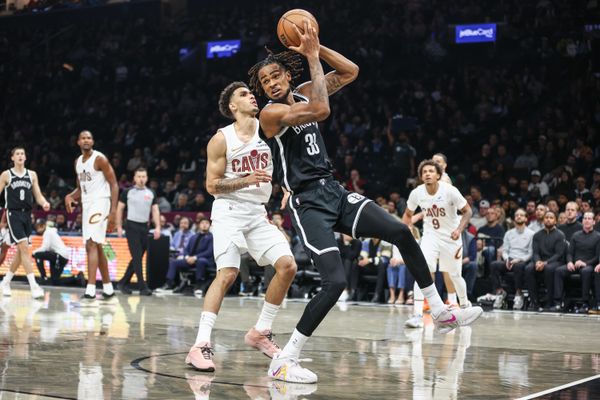 Oct 24, 2025; Brooklyn, New York, USA;  Brooklyn Nets center Nic Claxton (33) looks to post up against Cleveland Cavaliers guard Tyrese Proctor (24) in the second quarter at Barclays Center. Mandatory Credit: Wendell Cruz-Imagn Images
